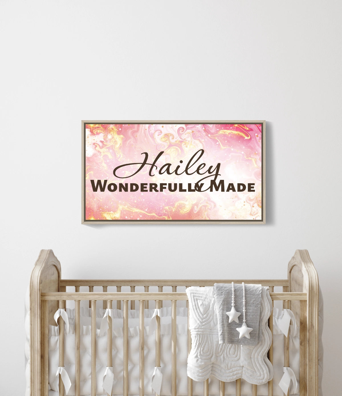 Personalized nursery room wall art printed on a framed, stretched canvas and displayed on a white wall.