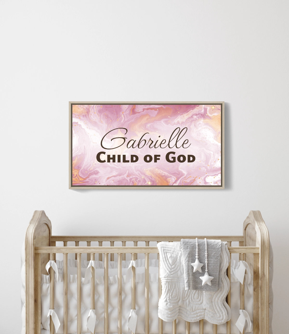 Personalized nursery room wall art printed on a framed, stretched canvas and displayed on a white wall.