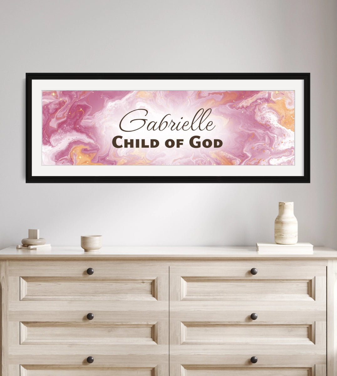 Personalized Christian nursery decor above a wooden dresser.