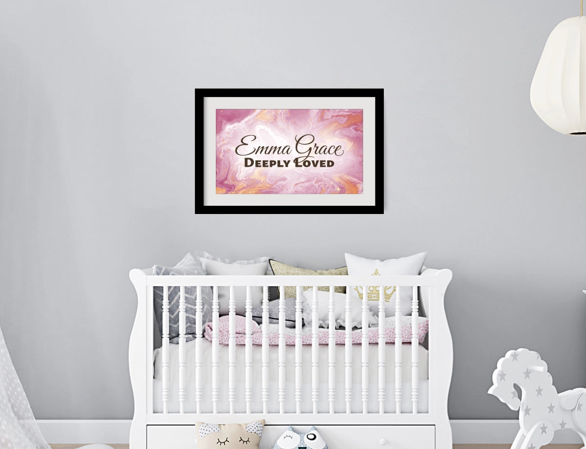 Personalized nursery room wall art printed with a white border, framed and displayed on a wall above a crib.