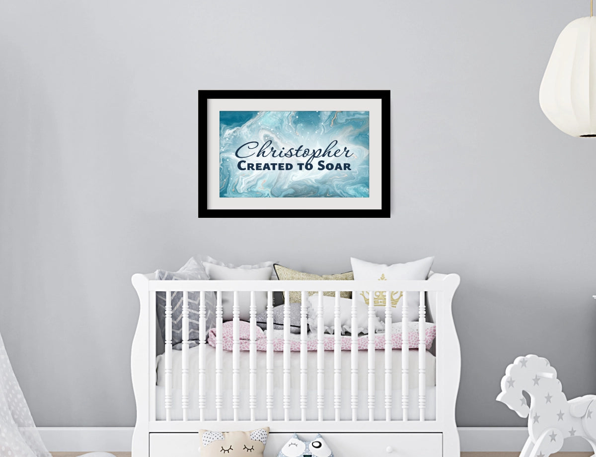 Personalized nursery room wall art printed with a white border, framed and displayed on a wall above a crib.