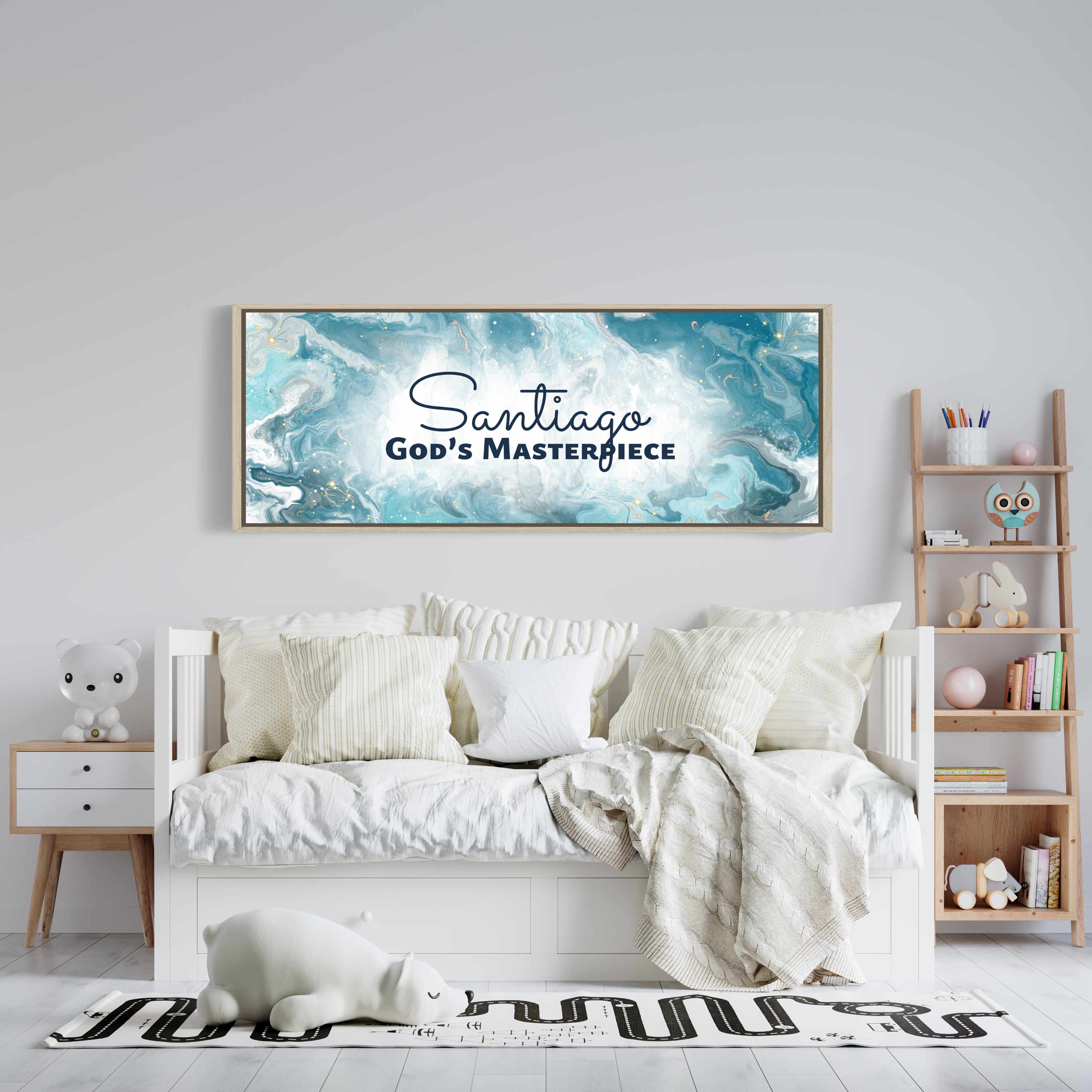 Framed, personalized wall art with ‘Santiago God’s Masterpiece' text above a white bed with white bedding in a child’s room