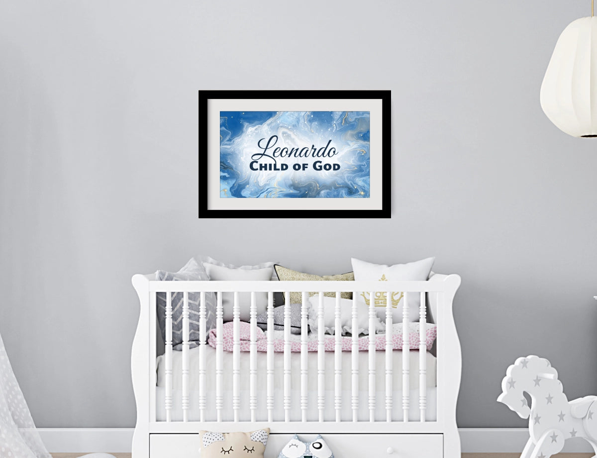 Personalized nursery room wall art printed with a white border, framed and displayed on a wall above a crib.