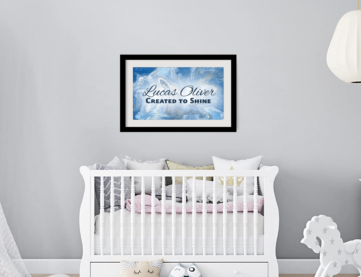Personalized nursery room wall art printed with a white border, framed and displayed on a wall above a crib.