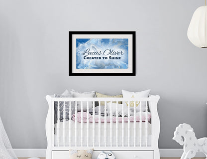 Personalized nursery room wall art printed with a white border, framed and displayed on a wall above a crib.