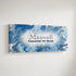 Personalized nursery room art printed on a stretched canvas and displayed on a white wall.