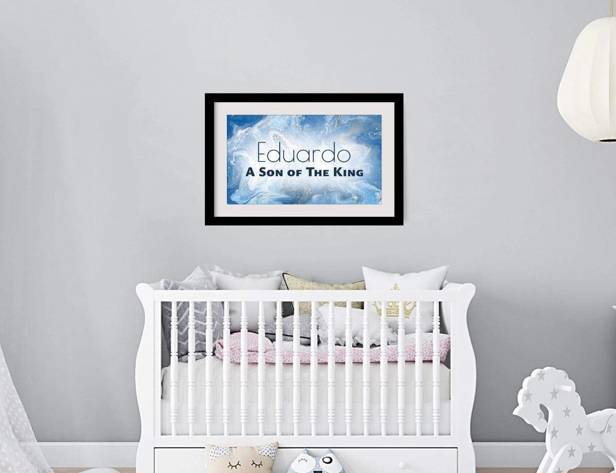 Personalized nursery room wall art printed with a white border, framed and displayed on a wall above a crib.