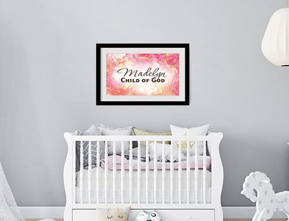 Personalized nursery room wall art printed with a white border, framed and displayed on a wall above a crib.