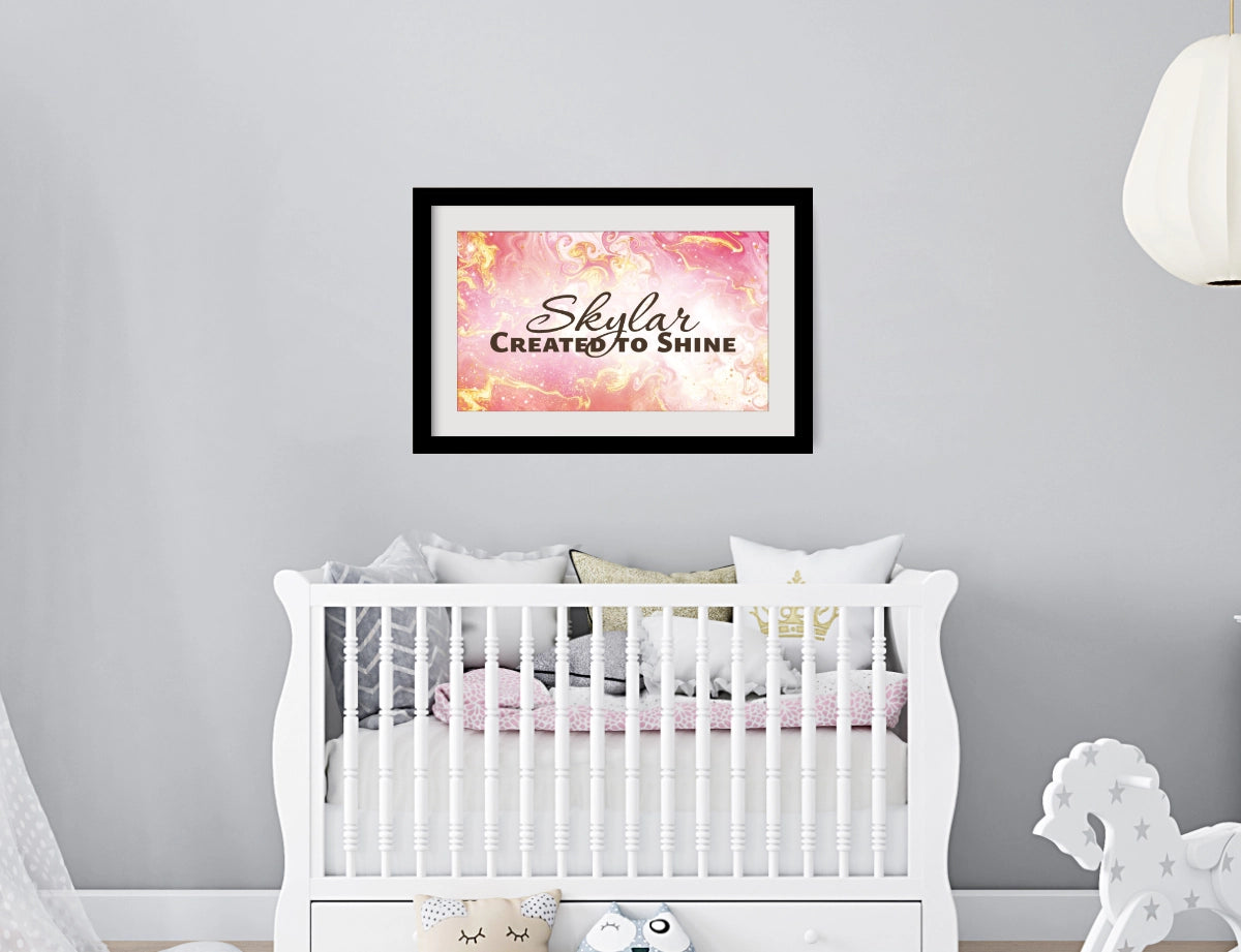 Personalized nursery room wall art printed with a white border, framed and displayed on a wall above a crib.