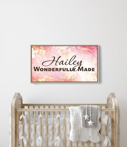 Personalized nursery room wall art printed on a framed, stretched canvas and displayed on a white wall.