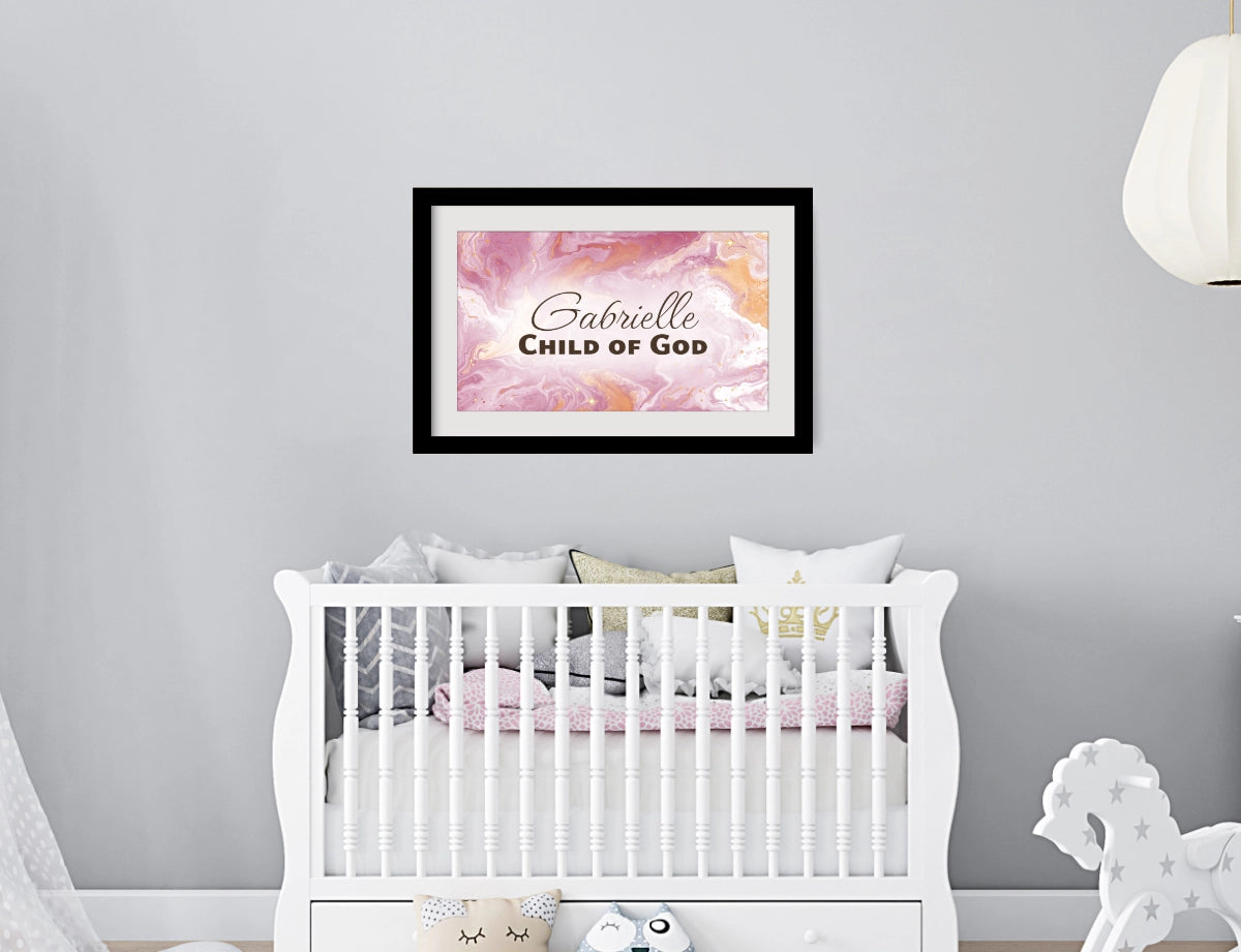 Personalized nursery room wall art printed with a white border, framed and displayed on a wall above a crib.