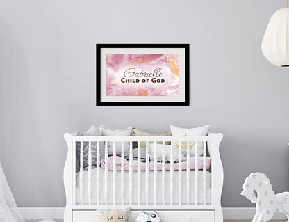 Personalized nursery room wall art printed with a white border, framed and displayed on a wall above a crib.