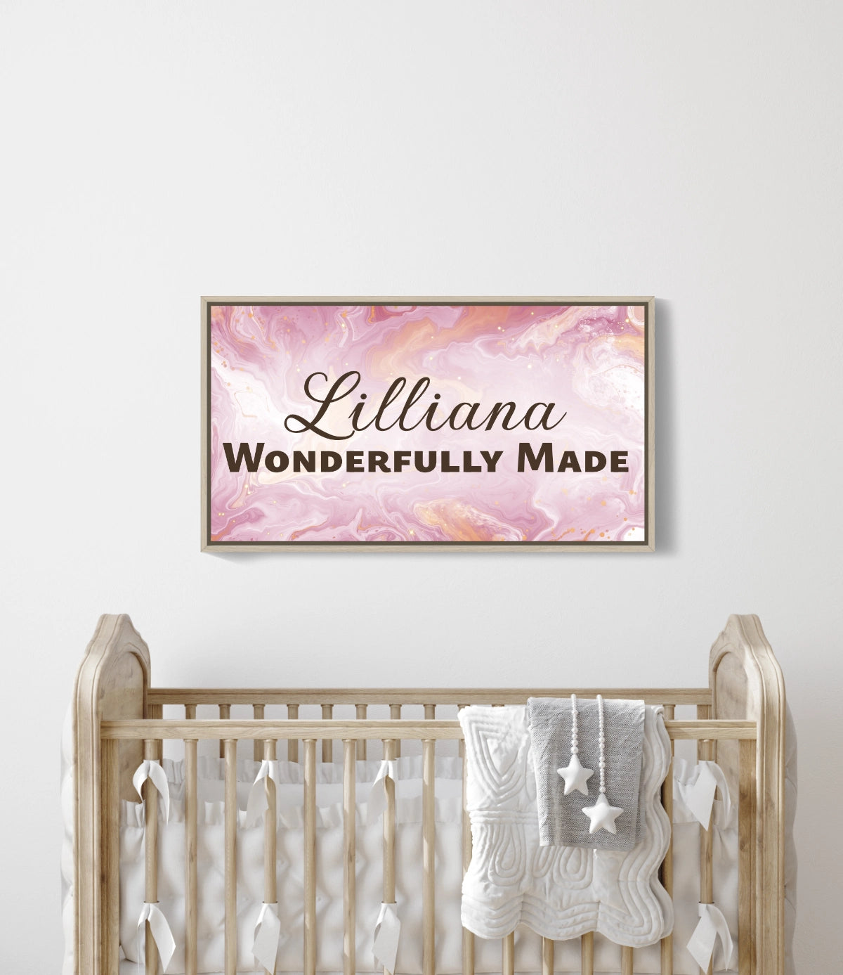 Personalized nursery room wall art printed on a framed, stretched canvas and displayed on a white wall.