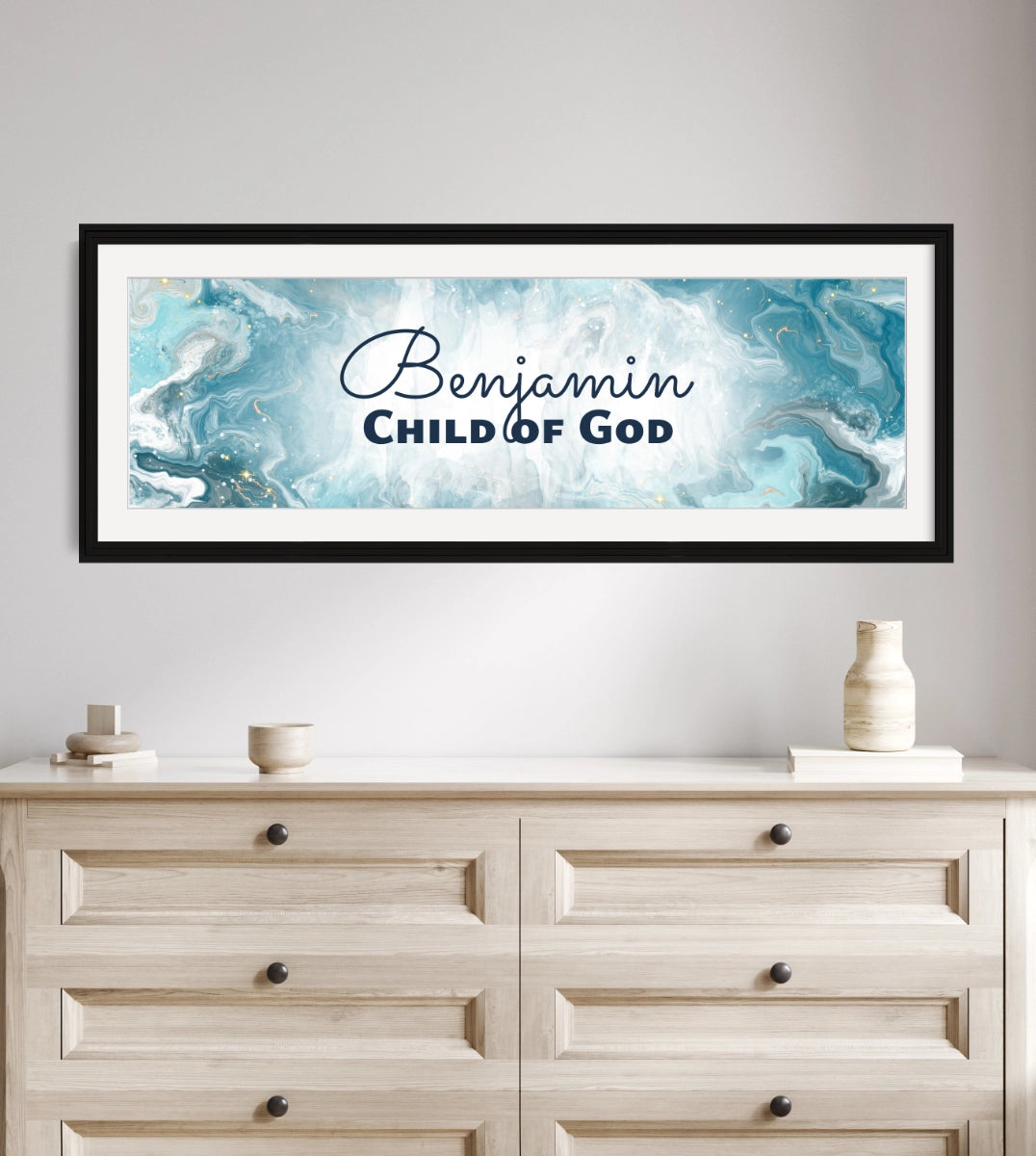 Personalized Christian nursery decor above a wooden dresser.