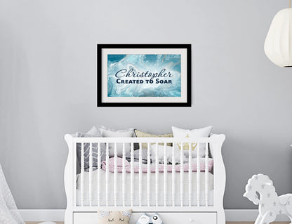 Personalized nursery room wall art printed with a white border, framed and displayed on a wall above a crib.