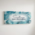 Personalized nursery room art printed on a stretched canvas and displayed on a white wall.