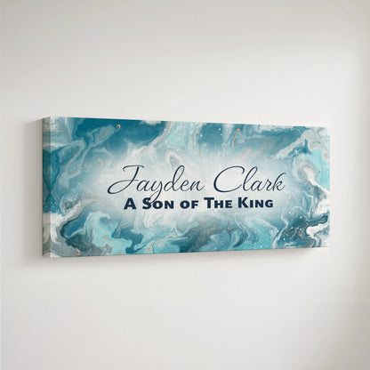 Personalized nursery room art printed on a stretched canvas and displayed on a white wall.