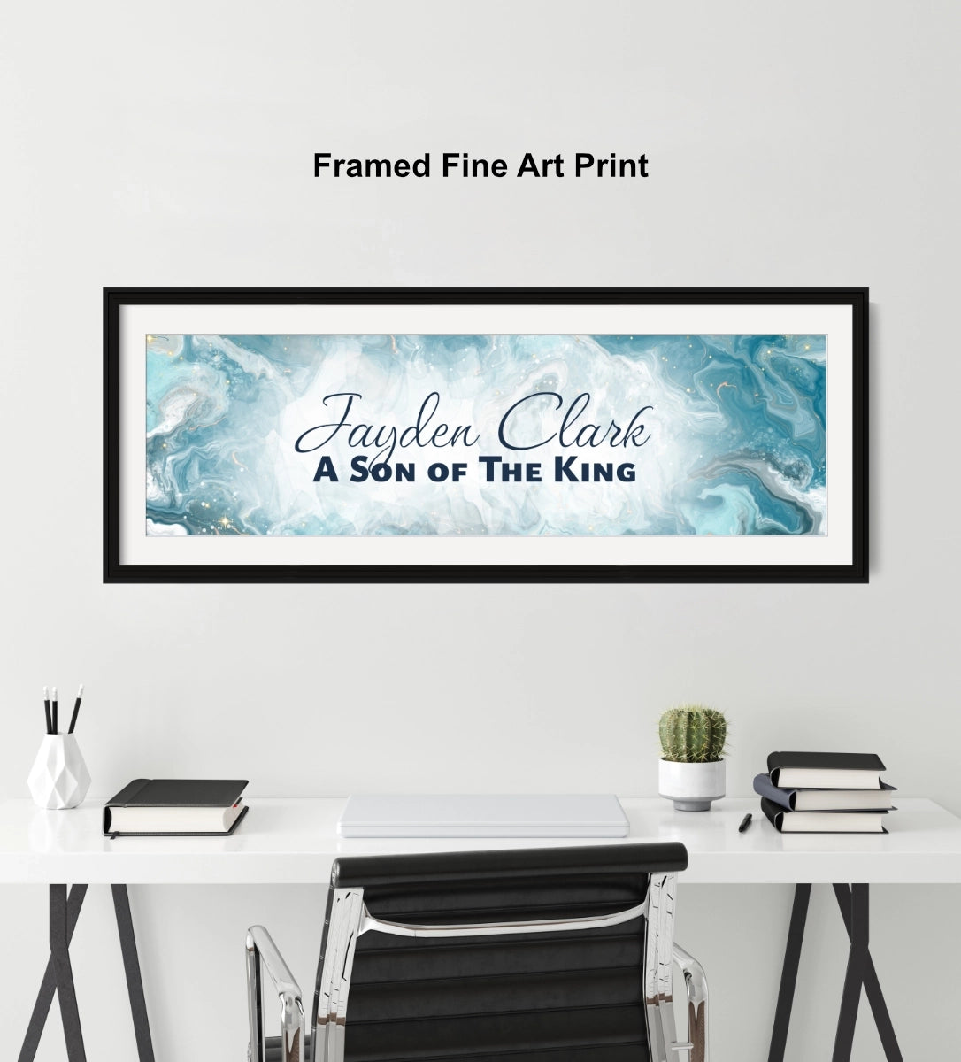 Personalized name sign on a wall above a desk.