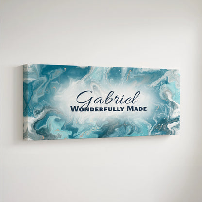 Personalized nursery room art printed on a stretched canvas and displayed on a white wall.