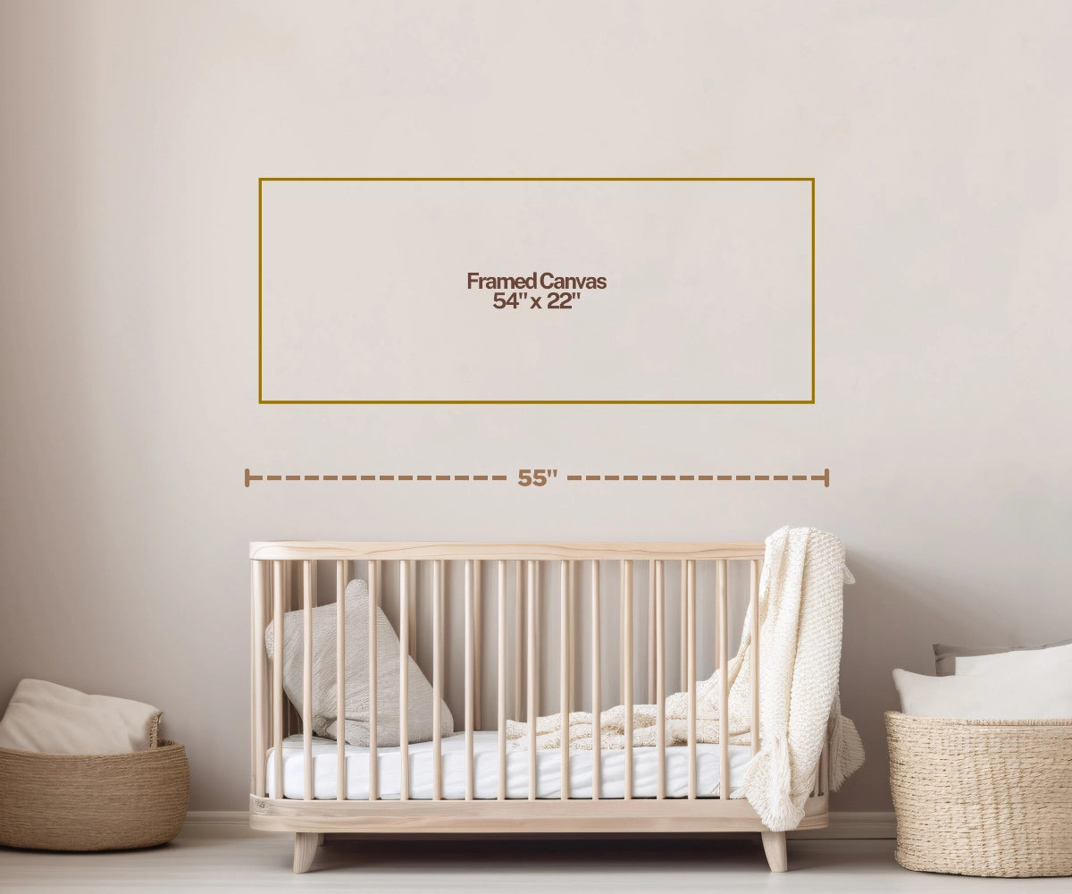 Wall art size guide on a nursery wall above a wooden crib