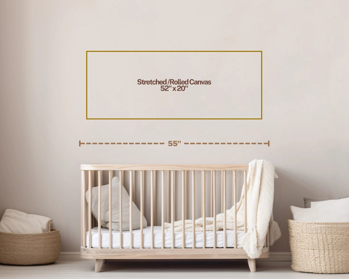 Wall art size guide on a nursery wall above a wooden crib